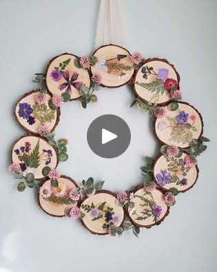 1.5M views · 11K reactions | Making a wood slice wreath using dried pressed flowers and artificial flowers! I made this last spring & still have this hanging in my kitchen! 💛🌼 I'll have the full how to video in the comments! 

 #springcrafts #diyspringdecor #pressedflowers #springdiy #woodslices #woodendecor #springwreath #NaturalDecor #diycraftsideas | Love Crafted Decor Flower Jars, House Decorations Ideas, Wood Slice Decor, Dried Flower Art, Craft Night Ideas, Flower Tips, Gardening Crafts, Dried Pressed Flowers, Pressed Flower Crafts