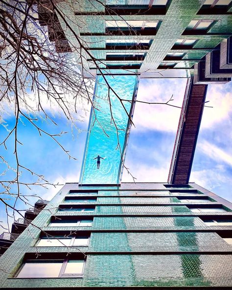 Residents can swim across 100-ft-high Sky Pool to neighboring high rise Sky Pool, London Neighborhoods, Awesome Architecture, Building A Pool, Lap Pool, High Rise Building, Apartment Garden, Red Walls, Garden Set