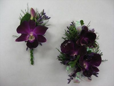 Dark purple dendrobium orchid corsage and boutonniere Purple And Black Corsage, Prom Corsage Purple, Orchid Corsage, Prom Things, Purple Boutonniere, Black Corsage, Orchid Boutonniere, Corsage Ideas, Orchid Corsages