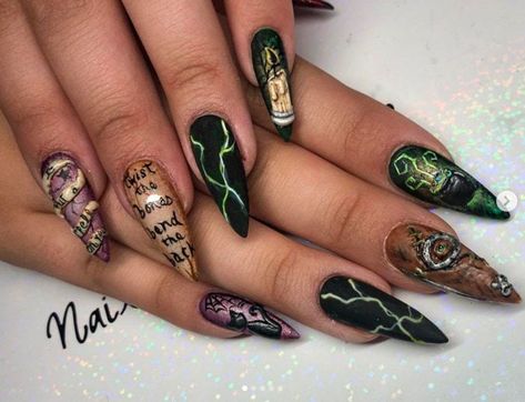 These fun Hocus Pocus nail art designs and ideas will inspire your spooky Halloween nails! These manicures feature the book, the black cat Binx, the Sanderson Sisters Winifred, Sarah, and Mary, and the zombie Billy even makes an appearance. #hocuspocus #nailart #halloweennails #naildesigns Double Stamping Nail Art, Sarah Sanderson Nails, Practical Magic Nail Art, Gothic Fairy Nails, Hocus Pocus Nails Design, Acrylic Nails For Halloween, Sanderson Sisters Nail Art, Hocus Pocus Halloween Nails, Unique Halloween Nail Designs