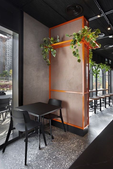 Black And Orange Restaurant Interior, Black And Orange Office Interior Design, Orange And Blue Restaurant Interior, Orange And Black Interior Design, Concrete Restaurant Design, Orange And Black Interior, Hamburger Restaurant Design, Orange Restaurant Interior, Urban Restaurant Design