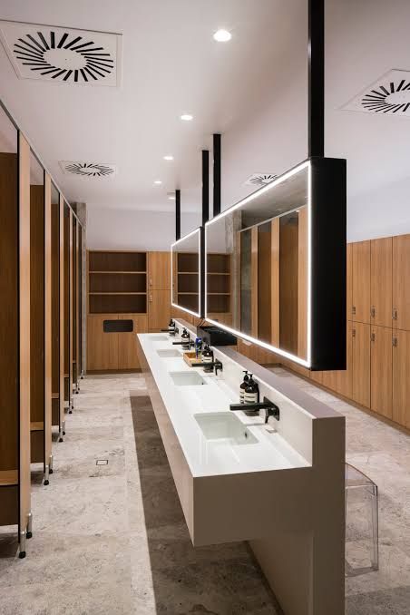 Bathroom Office Design, Community Bathroom Ideas, Commercial Toilet Design Interiors, Office Bathrooms Business, Corporate Bathroom Design, Public Shower Room Design, Gym Showers Design, Gym Bathroom Design, Gym Washroom Design