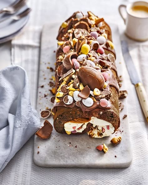 This double-chocolate and caramel Easter rocky road roulade is a decadent finale to a celebratory Easter lunch. Easter Baking Ideas, Easter Cooking, Easter Cake Recipes, Easter Lunch, Delicious Magazine, Easter Baking, Easter Eggs Chocolate, Rocky Road, Easter Chocolate