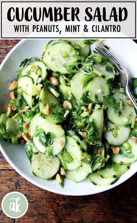 Samin Nosrat's Vietnamese cucumber salad — so refreshing! This salad is big on the acid — lime + rice vinegar — and the herbs — cilantro + mint — and tastes spicy, sweet, crunchy, and salty all at once thanks to jalapeños, sugar, peanuts, and fish sauce. Heaven in a bowl! #cucumber #peanuts #cilantro #mint #salad #vietnamese Vietnamese Cucumber, Samin Nosrat, Growing Cilantro, Resep Salad, Lime Rice, Cucumber Salad, Rice Vinegar, Delicious Salads, Fresh Herbs