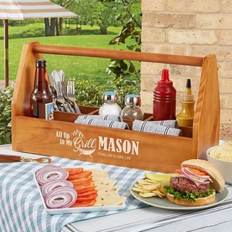 Grab-and-go rustic wood caddy keeps your grill guy stocked with his favorite condiments and utensils whether he’s in the backyard or the backwoods. •Made of durable pine wood •Measures 22.5″Lx7.75'Wx14.5″H •Engrave with any name up to 10 characters and message up to 22 characters "All up in my grill" will always appear •Wipe clean with a damp cloth •Item cannot be gift-boxed Up In My Grill BBQ Caddy, Personalized Wood Caddy Decor Ideas, Grill Caddy, Gifts For Sports Lovers, Unique Husband Gifts, Bbq Caddy, Wood Caddy, Condiment Caddy, I Grill, Outdoor Gifts