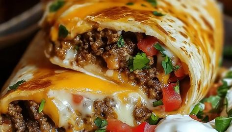 The Nacho Cheese Beef Wrap is a quick, flavorful dish combining seasoned ground beef, creamy nacho cheese, and fresh ... Read more Nacho Cheese Beef Wrap Recipe, Nacho Cheese Beef Wrap, Beef Wraps, Cheese Tacos, Nachos Beef, Nacho Cheese Sauce, Nacho Cheese, Quick Lunches, Lean Protein