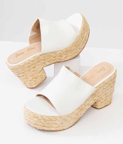 These 1970s inspired sandals feature a trendy woven platform design that will have you turning heads wherever you go. The crisp white color adds a fresh touch to any outfit, while the slip-on style makes them easy to wear on-the-go. The open toe vamp allows your feet to breathe while showing off your pedicure. Complete with a 2 inch platform and 4 inch heels.Available while supplies last. White Platform Sandals, Gold Platforms, Platform Design, Woven Sandals, White Platform, Platform Sandals Heels, Magical Girl, Platform Sandals, Unique Vintage