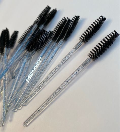 These are our black & blue glitter lash spoolies 🦋 With each lash purchase, you will receive one of these. ☺️  • • Sticking to our color scheme we made sure everything was included 🥳 down to the spoolies😂 Not only can you use these to keep your lashes fluffy and soft, they can also be used to do eyebrows! Multipurpose tools are the  b e s t !  • • BECOME A #BVSEDBABE ! Join our mailing list for info on our launch date, exclusive deals, & more! Link in bio 🖥 • • • • #BvsedCosmetics #bvsedbabe Instagram Brows, Multipurpose Tools, Brow Lash, Mailing List, Blue Glitter, Color Scheme, Black Blue, Eyebrows, Eyelashes