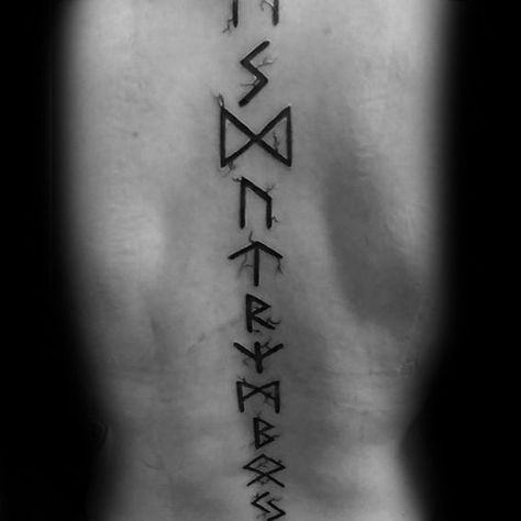 Center Of Back Rune Spine Tattoos For Guys Runes Back Tattoo, Viking Rune Spine Tattoo, Manacled Tattoo, Dramione Tattoo, Rune Tattoos, Hieroglyphics Tattoo, Runes Tattoo, Viking Rune Tattoo, Viking Tattoo Symbol