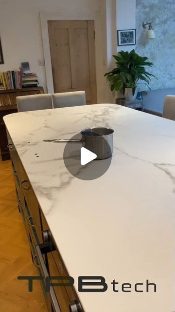 Isn't this a sight to behold? 😍✨ Our TPB tech induction kitchen island has taken centre stage in our client's stunning home, boasting the elegant Torano Statuario finish! 🏡💎⁠ ⁠ But wait, there's more! ⁠ ⁠ With 18 different colours and finishes to choose from—ranging from the natural allure of stone to luxurious marble, chic metallics, and sleek solid black—your dream kitchen awaits. 💫⁠ ⁠ Invisible Induction, Experience Center, Centre Stage, Different Colours, Center Stage, Dream Kitchen, Solid Black, Kitchen Island, Kitchen Design