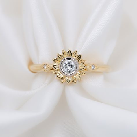 A unique 18ct yellow gold engagement ring featuring a sunflower style centre setting with customers diamond and white gold.   #RyleyJewelleryCreations #jewellery #luxuryjewellery #customjewellery #toowoomba Round Flower Engagement Ring, Sunflower Wedding Ring, Sunflower Wedding Rings, Sunflower Engagement Ring, Dream Rings, Sunflower Ring, Yellow Gold Engagement Ring, Flower Engagement Ring, Yellow Gold Engagement