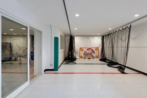 Basement Hockey Room with Black Nets - Transitional - Basement Basement Hockey, Tan Sectional, Transitional Basement, Dark Grey Sectional, Basement Craft Rooms, Basement Movie Room, Contemporary Basement, Basement Games, Hockey Room