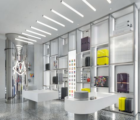 FRAME | Up, up and away: Rimowa’s NYC store prepares clients for smooth travelling Passport Photo Booth, Corian Stone, Soho Ny, Aluminum Shelves, Nyc Studio, Passport Photo, Luggage Brands, Opening A Boutique, Mirror Interior