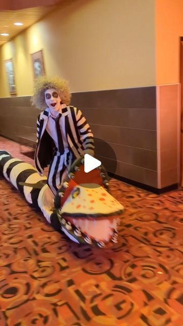 Jesse Myer on Instagram: "You know it’s showtime when the Juice is loose and riding a sandworm to @cinemark ! 🖤🐍🎬  #beetlejuice #beetlejuice is Now Playing only in theatres.  Get tickets now!" It’s Showtime Beetlejuice, Beetlejuice Sandworm Costume, Sand Worm Beetlejuice, Sandworm Costume, Beetlejuice Broadway, Sandworm Beetlejuice, Beetlejuice Characters, Beetlejuice Sandworm, Beetlejuice Costume