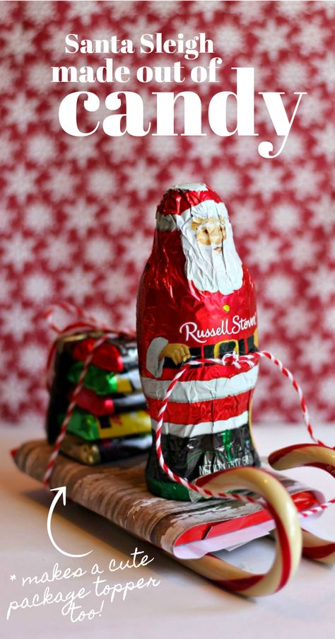 We love this craft! Made entirely out of candy, learn how to make this Santa candy sleigh Christmas craft entirely out of candy! Use candy canes and favorite candy bars and a large chocolate Santa to assemble this fun Santa on a sleigh - a fun homemade Christmas party favor that also makes a great package topper for handmade gift idea! Holiday Bazaar Craft Ideas, Diy Santa Sleigh, Sleigh Craft, Candy Train, Christmas Candy Crafts, Candy Sleigh, Candy Cane Sleigh, Kids Sleepover, Chocolate Santa