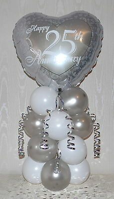 BALLOON ON A BASE DISPLAY. MAKES A GREAT TABLE CENTERPIECE. 1 INSTRUCTION SHEET. ALL YOU NEED TO MAKE THIS DISPLAY. A LENGTH OF WHITE TYING RIBBON.