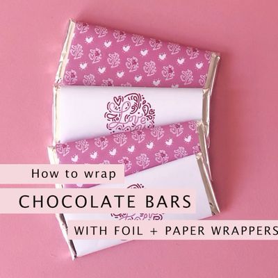 How to wrap chocolate bars in foil and printable paper wrappers. Wrappers are a great way to add customisation to party favours and tie a theme in. Here’s a quick demo on how I put together my Love You Script chocolate bars for Valentines Day. | A Visual Merriment #hersheys #choclatebarwrappers #loveprintables #weddingprintables #chocolate #partyfavors Wrapping Chocolate Bars, Diy Chocolate Bars, Wrappers Diy, Homemade Chocolate Bars, Chocolate Bar Wrapping, Hershey Bar Wrappers, Hershey Chocolate Bar, Chocolate Wrapping, Chocolate Bar Wrappers