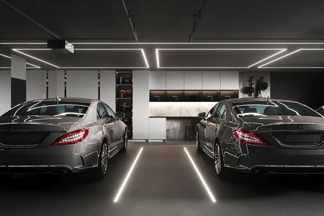 To provide perfect lighting in your home garage, you can also install lights on the garage floor. Using Led lights that are placed on the floor gives an attractive design and can steal the eye. Apart from that you can also add a ceiling light to give the perfect lighting. Floor LED Light from @konzeptarchitects #garagelightingideas #lightingideas Modern Garage Design, Industrial Garage, Led Garage Lights, Stylish Car, Cool Garages, Luxury Garage, Garage Organize, Old Garage, Modern Garage