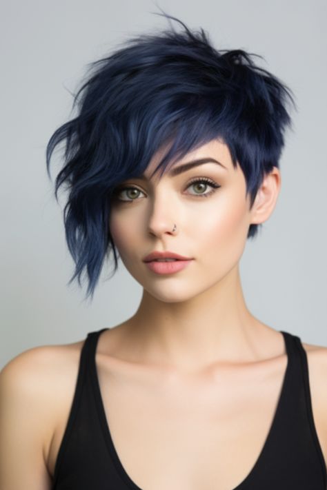 Dive deep into a midnight blue shaggy pixie. You’ll find the dark blue hues give off a mystical, enchanting aura. Click here to check out more trending shaggy pixie cut ideas for 2023. Shaggy Pixie Cuts, Shaggy Pixie, Funky Short Hair, Asymmetrical Pixie, Short Hair Pixie Cuts, Edgy Short Hair, Fun Hair, Long Pixie, Funky Hairstyles