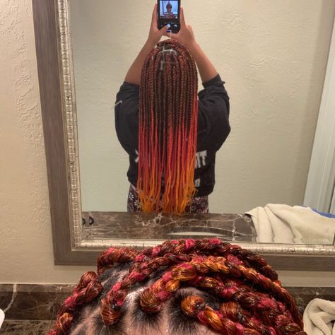 Orange Peek A Boo Braids, Orange Peekaboo Hair Braids, Red And Orange Knotless Braids, Peekaboo Braids Orange, Orange Box Braids With Curly Ends, Split Color Box Braids, Box Braids Orange And Black, Ombre Box Braids, Black To Red Ombre