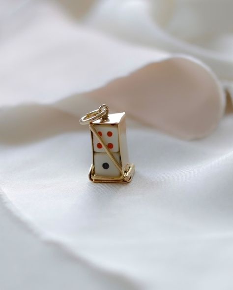 Playful and elegant? Yes please! This 9ct gold dice holder charm is perfect! Featuring a crafted case with two mini dice (white with black & white with red dots), it’s a whimsical yet stylish addition to any bracelet or necklace. 🎲 ✨ Fully hallmarked from 1960, it measures 2cm length, 9mm width, and weighs 1.9 grams—perfect for collectors or as a unique gift. Available now. Link in bio. ✨ #VintageCharm #GoldJewelry #UniqueFinds #CharmBracelet #MyGoldenFinds #GoldJewellery Dice Necklace, Dice Holder, Red Dots, Vintage Charms, Hallmark, The Collector, Link In Bio, Gold Jewelry, Unique Gifts