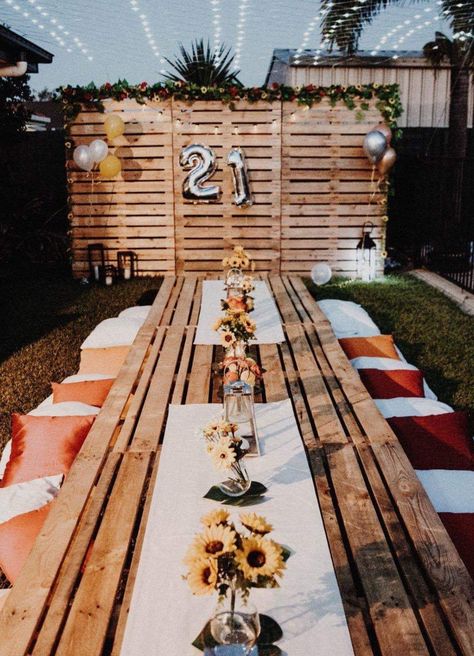 Boho party. Pallet tables & pallet wall with festoon lights & sunflower & rose ivy #bohoparty Pallet Theme Party, 21st Boho Party Ideas, Pallets Decoration Party, Pallet Table Party, Boho 21st Birthday Party Ideas, Backyard Boho Party, Pallet Birthday Decor Party Ideas, Decor Ideas For Birthday Party, Pallet Party Decor