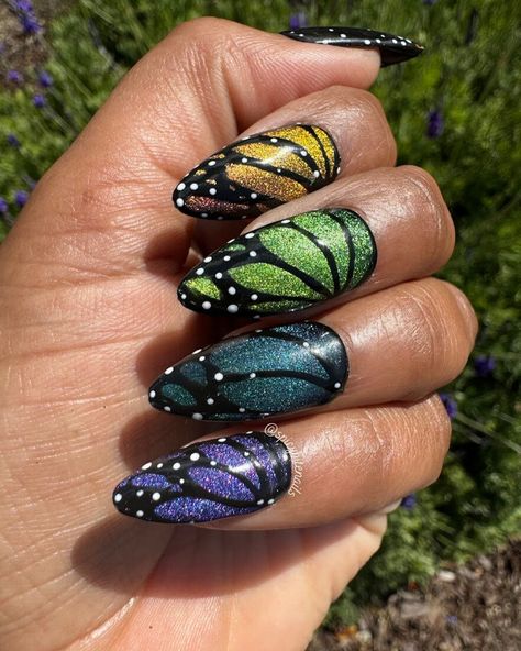 Rainbow color shifting butterfly nails are the perfect way to celebrate the return of the sun for spring.  5 different shades of color shifting cat-eye polish make these nails mesmerizing, especially in the sunlight.   All nails are designed and hand painted with high quality gel polish and products. Shapes shown are for demonstration purposes only, you can choose your desired shape before purchasing!  Processing time for each set is 3-5 business days while shipping times may vary. 🌶 WHAT'S INCLUDED 🌶 -a set of 10 press-on nails -a mini nail file -nail glue -alcohol wipes -wooden cuticle pusher -application instructions 🌶 APPLICATION OF PRESS-ON NAILS 🌶 1. Make sure the nail surface area is clean and free of oil and debris (no lotion!) 2. Use the mini file to lightly file the surface o Seeing Eye Nails, Cat Eye Butterfly Nails, Fairy Wing Nails, Butterfly Wing Nails Design, Black Rainbow Cat Eye Nails, Gothic Butterfly Nails, Butterfly Wing Nails, Butterfly Nail Designs, Eye Nail Art