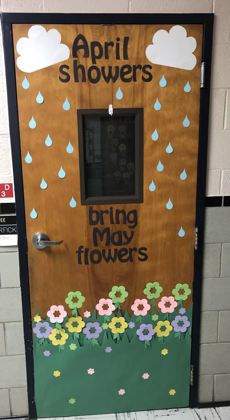 “April showers bring May flowers” door decor Spring Classroom Decorations, Spring Classroom Door, Preschool Door, Classroom Door Decor, Door Decorations Classroom Christmas, Easter Classroom, Spring Door Decoration, Infant Classroom, School Door Decorations