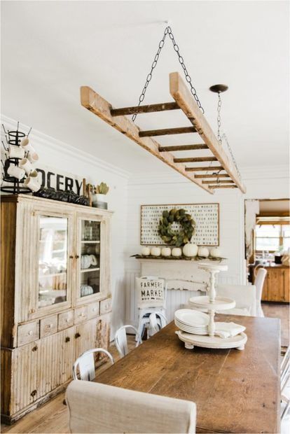 Old Ladder Hung From Dining Room Ceiling Makes A Dreamy Rustic Light Ladder Light Fixture, Hanging Ladder, Rustic Ceiling Lights, Old Ladder, Rustic Light, Classic Dining Room, Rustic Ceiling, Dining Room Ceiling, Dining Room Light Fixtures