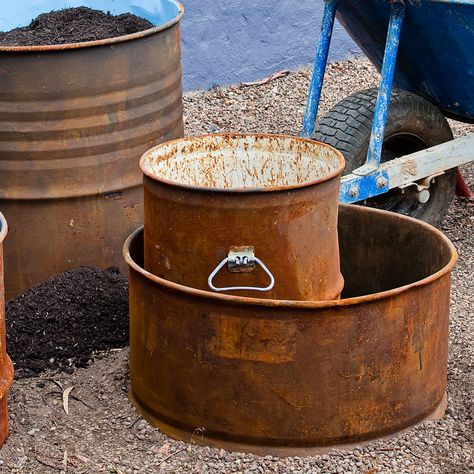 Metal drum planter: DIY rustic planters made from an old drum | Better Homes and Gardens Barrel Garden Ideas, Greek Garden, Washing Machine Drum, Plastic Drums, Planter Diy, Barrel Table, Rustic Planters, Metal Drum, Metal Barrel