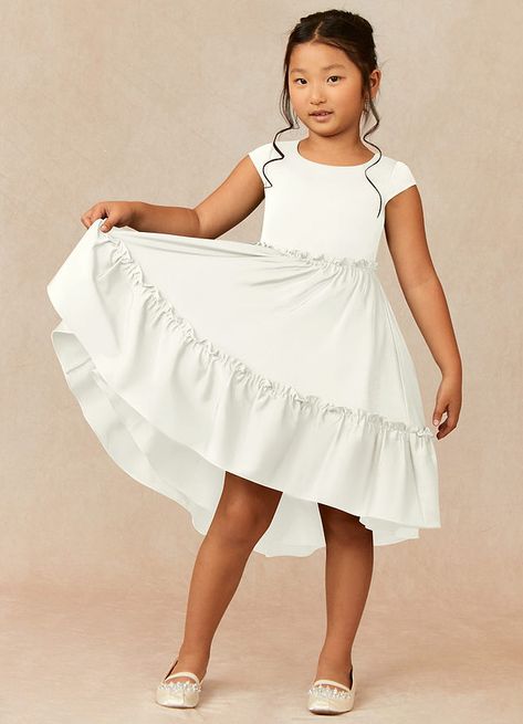 Lee is the perfect classy and cute ankle length stretch satin dress for your flower girl. She features a scoop neckline with cap sleeves and a two-tiered ruffled skirt. Her bow is detachable and can be attached at the back neckline or back waist. Satin Flower Girl Dresses, Flower Girl Outfit, Satin Flower Girl Dress, Flower Girl Ring Bearer, Girl Ring Bearer, Stretch Satin Dress, Ivory Flower Girl, Ivory Flower Girl Dresses, Ivory Flower