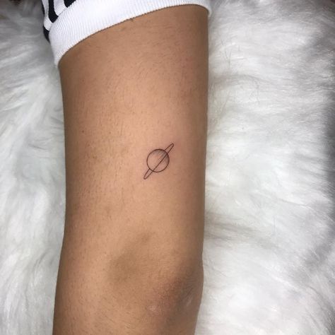 Saturn And Jupiter Tattoo, Moon And Saturn Tattoo Minimalist, Planet Fine Line Tattoo, Fine Line Planet Tattoo, Fine Line Saturn Tattoo, Tiny Planet Tattoo, Small Bicep Tattoos For Women, Planet Tattoos Simple, Small Saturn Tattoo