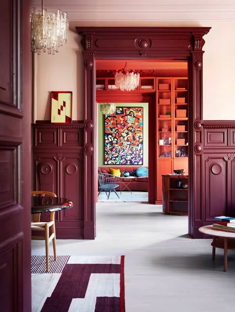 A Historic Apartment with Rich & Vibrant Color Combinations 1 Oxblood Cabinets, Red Skirting Boards, Red Trim Interior, Painted Moulding, Red Hallway, Maroon Walls, Burgundy Walls, Traditional Paint, Interior Vintage