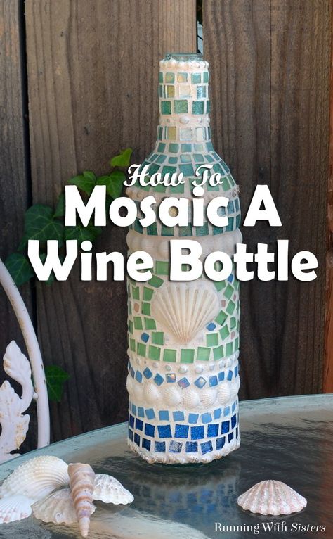 Learn how to make a mosaic wine bottle with shells and tiles! We'll show how to glue the tiles and mix the grout with a video and written steps! Mosaic Bottles, Nautical Crafts, Wine Bottle Corks, Bottle Ideas, Mosaic Art Projects, Bottle Craft, Wine Bottle Art, Wine Bottle Diy Crafts, Mosaic Ideas