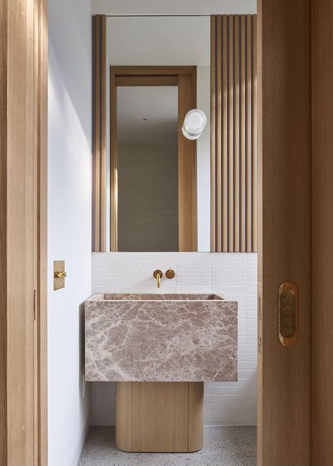 The powder room features a custom stone sink with a white oak base built by the homeowner. #dwell #homerenovations #toronto #moderndesign Bathroom Vanity Designs, 1920s House, Stone Counters, Interior Design Consultation, Vanity Design, Stone Sink, Chic Bathrooms, Bathroom Inspiration, 인테리어 디자인