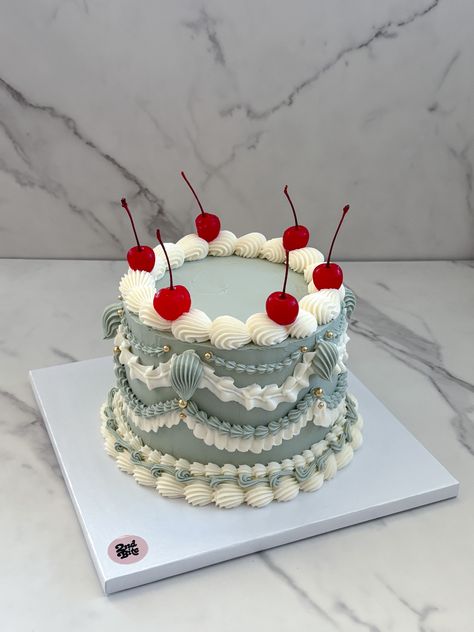 Vintage piping in sage green and white with gold pearl details and cherries Vintage Cake With Cherries, Birthday Cake With Pearls, Green Vintage Cake, Lambeth Piping, Green And White Cake, Sage Green Cake, White Vintage Cake, 24th Birthday Cake, Cake With Cherries