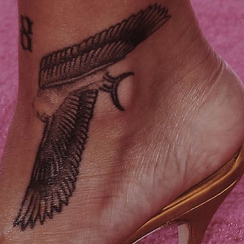 Rihanna ankle tattoo Rihanna Ankle Tattoo, Tattoo Rihanna, Jhene Aiko Tattoos, Rihanna Tattoo, Falcon Tattoo, Tummy Tattoo, Ankle Tattoo Designs, Ankle Tattoos For Women, Egyptian Tattoo