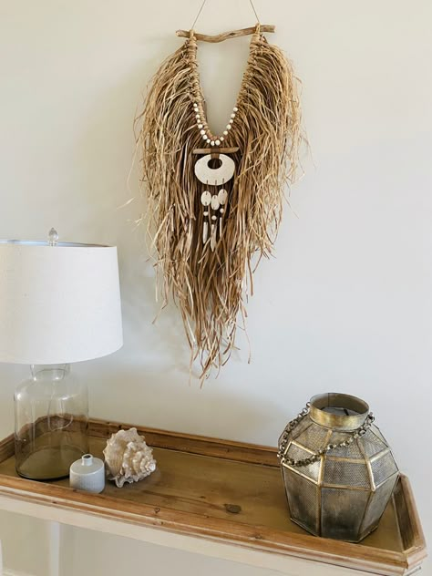 Raw & Earthy. This natural raffia wall hanging features a clay and hemp woven driftwood centrepiece. Handmade ꕥ Driftwood Crafts Wall Hangings, Interesting Wall Decor, Raffia Wall Hanging, Raffia Crafts, Weaving Wall Decor, Flax Weaving, Rustic Wall Hangings, Boho Crafts Diy, Yarn Wall Art