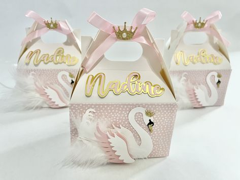 "Swan favor boxes These favor boxes are the perfect addition to any swan baby shower or party! * Comes in two sizes, mini and standard favor boxes. Mini is a great size for small candies or chocolates and the standard size is good for small toys, small drinks and snack chip bags. * Mini boxes measure: Length: 4\" Width: 2 1/2\" Height: 5 1/2\" * Standard boxes measure: Length: 3 1/2\" Width: 6 1/2\" Height: 6 1/4\" * Each box sold individually. * More swan decor available in my shop" Swan Soiree, Minnie Mouse Favors, Swan Baby Shower, Mini Boxes, Baby Shower Sweets, Scrapbook Box, Swan Decor, Small Toys