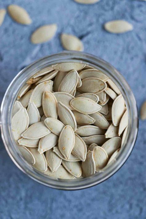 Garlic flavor roasted pumpkin seeds from scratch, using seeds from your Halloween pumpkin. Pumpkin Seed Recipes Roasted, Chickpeas Recipes, How To Roast Pumpkin, Roast Pumpkin Seeds, Preserving Pumpkins, Pumpkin Pulp, Vegan Halloween Food, Main Food, Pumpkin Seed Recipes