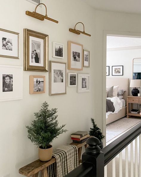 Art With Lighting Above, Gallery Lights Wall, Gallery Wall With Small Frames, Framed Photographs On Wall, Wall Sconces Hallway Pictures, Entry Table With Gallery Wall, Gallery Wall For Large Wall, Tasteful Gallery Wall, Gallery Wall With Shelf Living Room