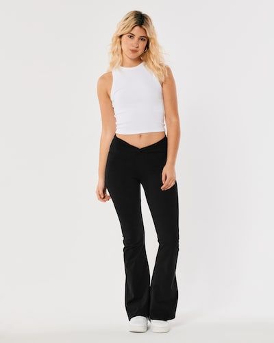 Women's Social Tourist V-Waist Leggings | Women's Bottoms | HollisterCo.com Hem Flare Pants, Hollister Leggings, Black Flares, Flared Leggings, Women's Bottoms, Teen Clothing, Flare Leggings, Soft Leggings, Split Hem