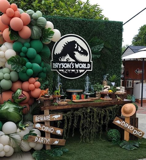 Throw a little dino-mite bash with decor inspired by the movie Jurassic Park! Let these fun ideas help you "build" the perfect party. #LavishMoments #KidsBirthday #Balloons #KidsBirthdayParty #SmallBusiness #BalloonArch #BalloonGarland #ToddlerParty #EventPlanning #BalloonDecor #BalloonStylist #ModernBalloons #LuxeBalloons #BirthdayBalloons #BalloonInspo #JurassicPark #JurassicWorld #JurassicWorldParty #JurassicParkParty #Dinosaur #DinosaurParty #JurassicParkBirthday #ParqueJurasico Jurassic Park Balloon Decor, Jurassic Park Party Balloons, Jurassic Park Outdoor Decorations, Jurassic Park Photoshoot, Jurassic World Balloon Garland, Dino Party Balloons, Jurassic Park Balloon Arch, Jurassic Park Balloons, Jurassic Park Party Decor