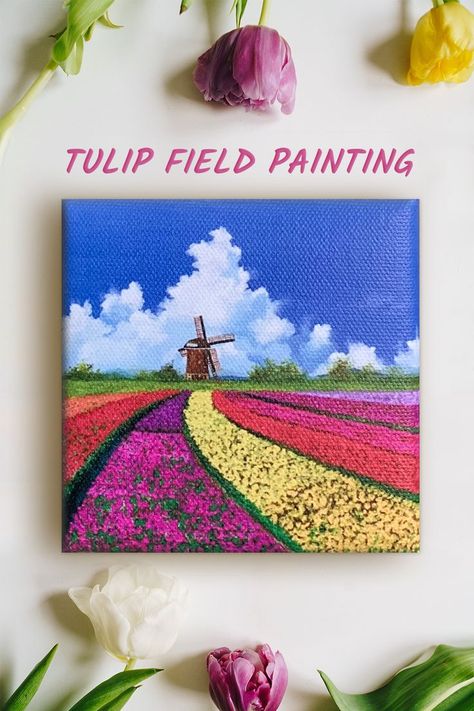 A photo with title 'tulip field painting'. There are five tulips on a white table. In the middle is a painting of dutch tulip fields with a windmill, white clouds and blue sky. It is an acrylic painting on canvas. Une photo avec le titre 'peinture champ de tulipes'. Il y a cinq tulipes sur une table blanche. Au milieu se trouve une peinture de champs de tulipes hollandais avec un moulin à vent, des nuages blancs et un ciel bleu. C'est une peinture acrylique sur toile. Netherlands Painting, Paintings Old, Mini Canvas Paintings, Small Canvas Prints, Tiny Canvas, Field Paint, Tulip Field, Field Art, Field Painting