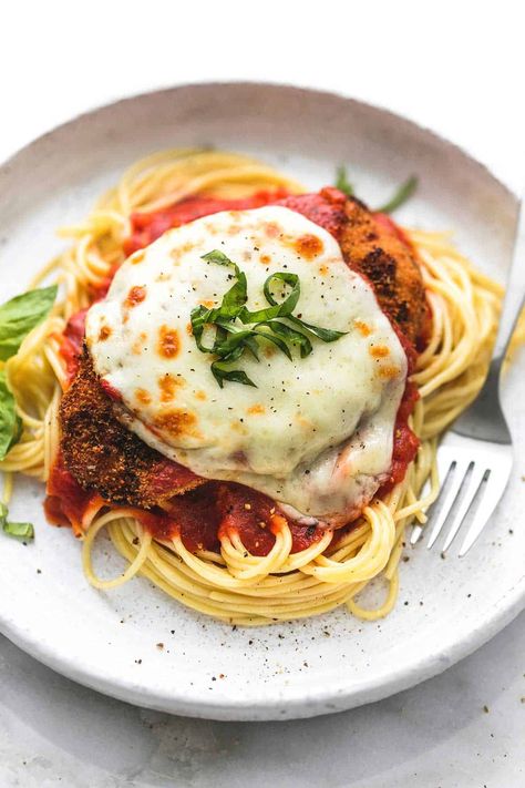 Easy and Healthy Baked Chicken Parmesan is a delicious and simple 30 minute meal you'll make again and again. | lecremedelacrumb.com Veal Parmesan Recipe, Veal Parmesan, Chicken Parm Recipes, Traditional Spaghetti, Chicken Parmesan Recipe Baked, Healthy Chicken Parmesan, Veal Cutlet, Chicken Parmesan Recipe, Celery Sticks