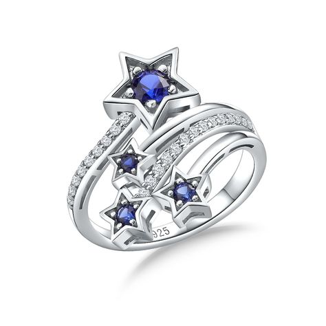 PRICES MAY VARY. SAPPHIRE STAR RING -- The star ring is a stackable style with four layers of interlocking bands, each adorned with a beautiful small star. 925 STERLING SILVER RING -- Crafted in hypoallergenic 925 sterling silver with 14k white plating, this star rings ensures exceptional durability, long-lasting shine and great comfort to fit. WOMEN'S STATEMENT RING -- The star statement ring decorated with created sapphire and created white sapphires. These blue gemstones are carefully selecte Blue Star Ring, Sapphire Rings For Women, Star Jewellery, White Rings, Star Rings, Star Sapphire Ring, Sapphire Rings, Ringe Gold, Star Sapphire