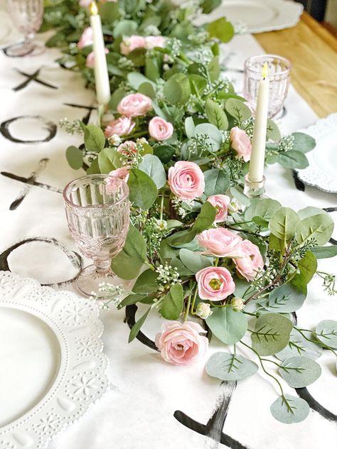 Easy, romantic table decor. The blush pinks of the ranunculus and the blue green leaves remind me of a meadow in springtime. Green And Pink Centerpieces, Ranunculus Table Decor, Pink And Green Table Setting, Remove Jar Labels, Romantic Table Decor, Painted Glass Vases, Romantic Table, Wall Paneling Diy, Eucalyptus Garland