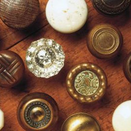 Comstock Images/Comstock/Getty Images Glass Door Knobs Crafts, Door Knobs Crafts, Diy Door Knobs, Craft Shelves, Old Door Knobs, Diy Coat Rack, Diy Knobs, Kitchen Door Knobs, Kitchen Wine Rack