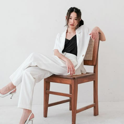 Sitting Sideways In Chair Pose, Fancy Sitting Poses, Person Sitting Side View Reference, Lounging In Chair Pose, Leaning In Chair Pose, Siting Pose Female On Chair, Power Poses For Women Sitting, Lounging On Couch Pose, Leaning On Chair Pose