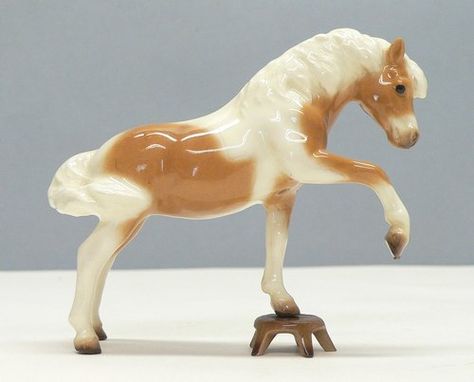 Hagen Renaker Mini Performing Misty  3 1/4 inches tall 1993  Sold as a special run for Breyer  Designed by Maureen Love Hagen Renaker Miniatures, Breyer Stablemates, Mini Horses, Hagen Renaker, Glass Menagerie, Mini Horse, Model Horses, Breyer Horses, Horse Figurine